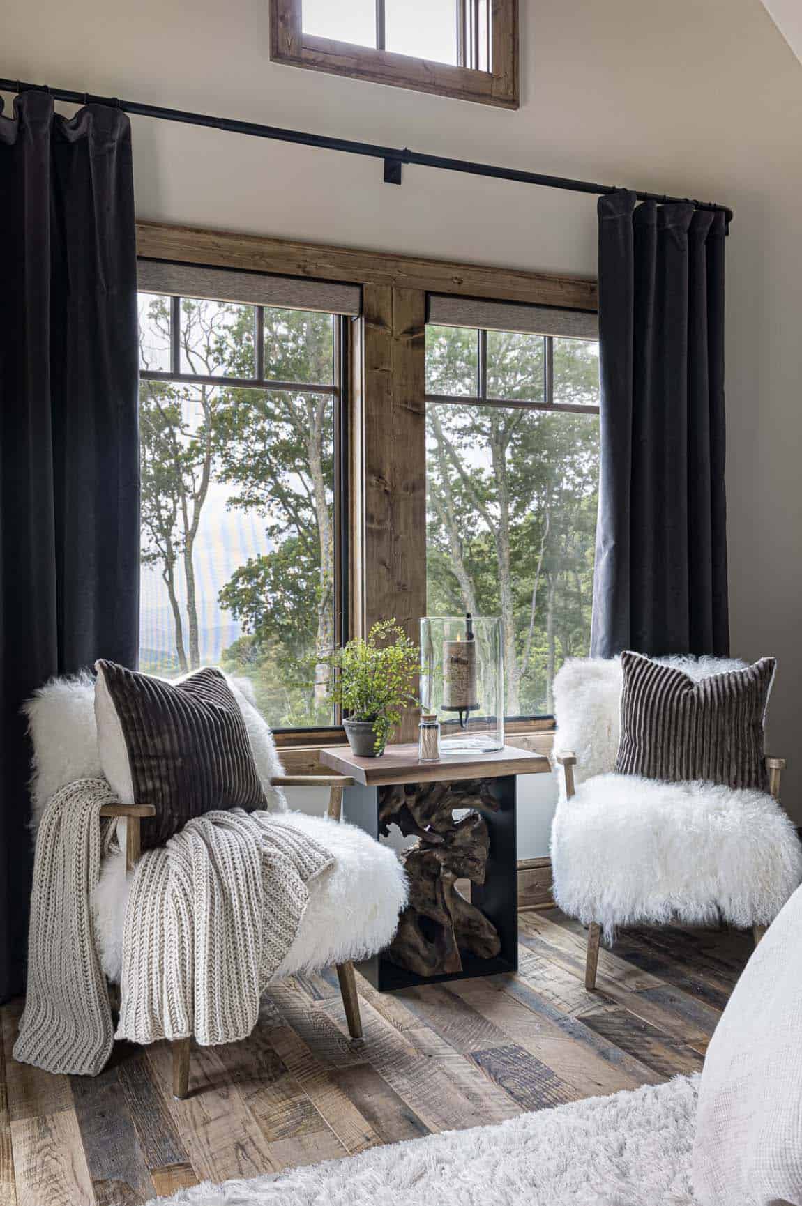 modern rustic bedroom sitting area in front of a window