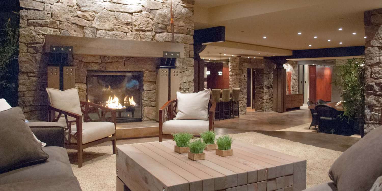 modern living room with a dual-sided fireplace