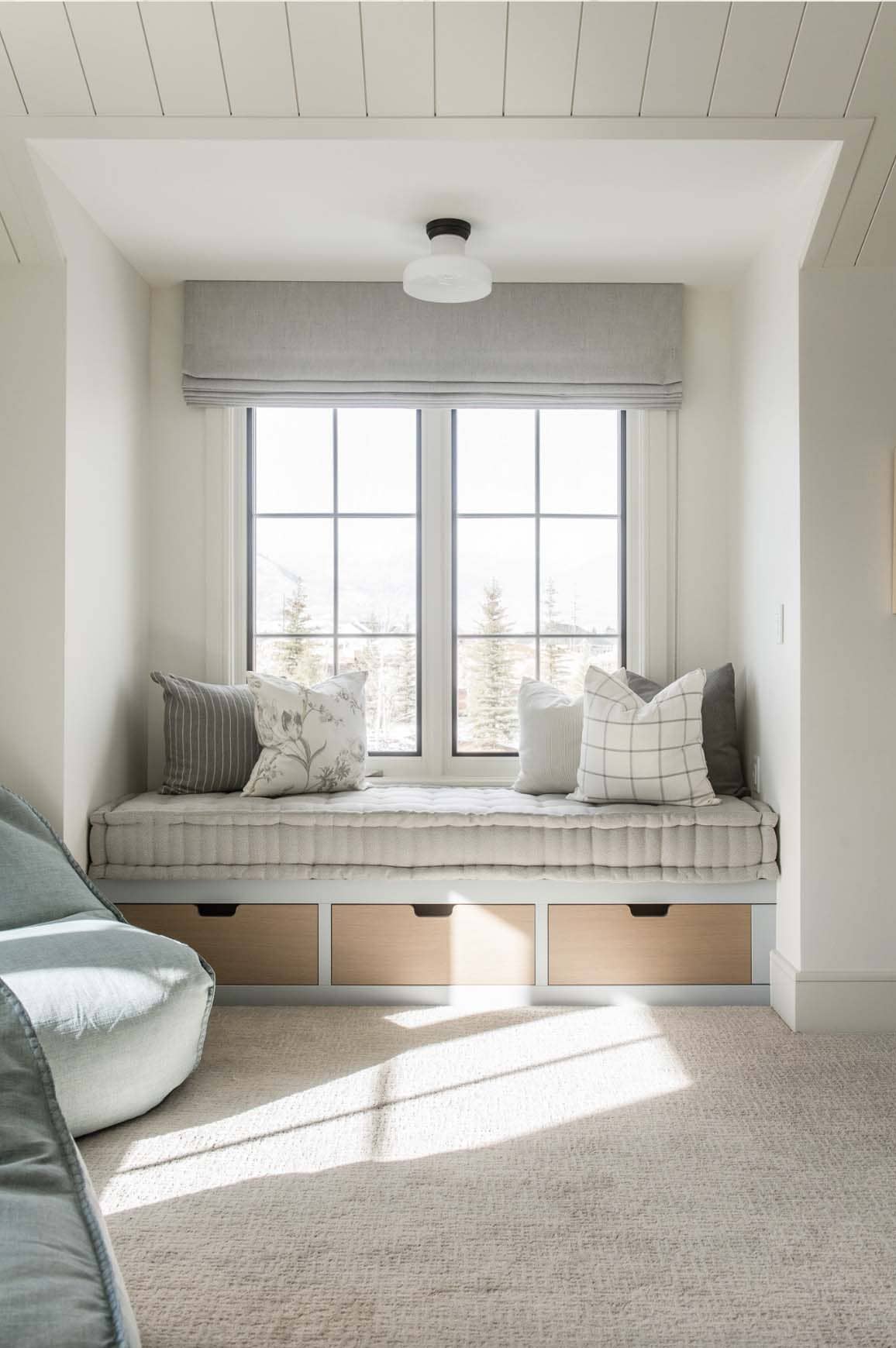 traditional farmhouse style playroom with a window seat