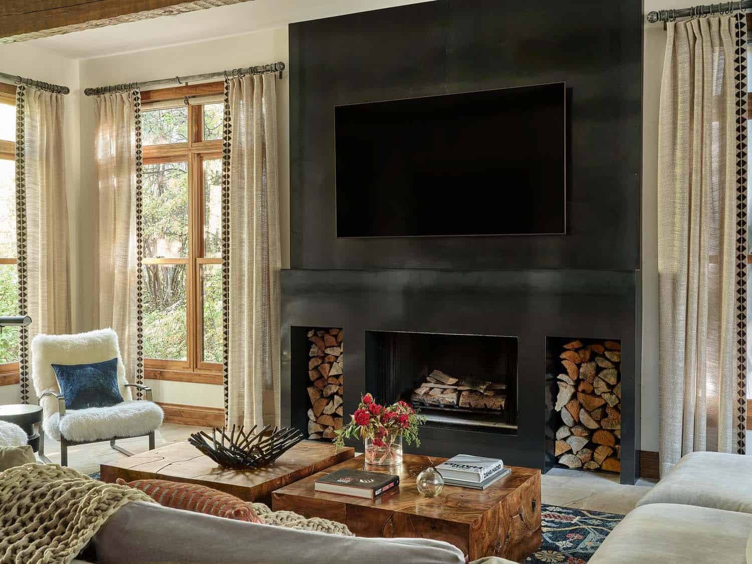 contemporary neutral living room with black steel fireplace
