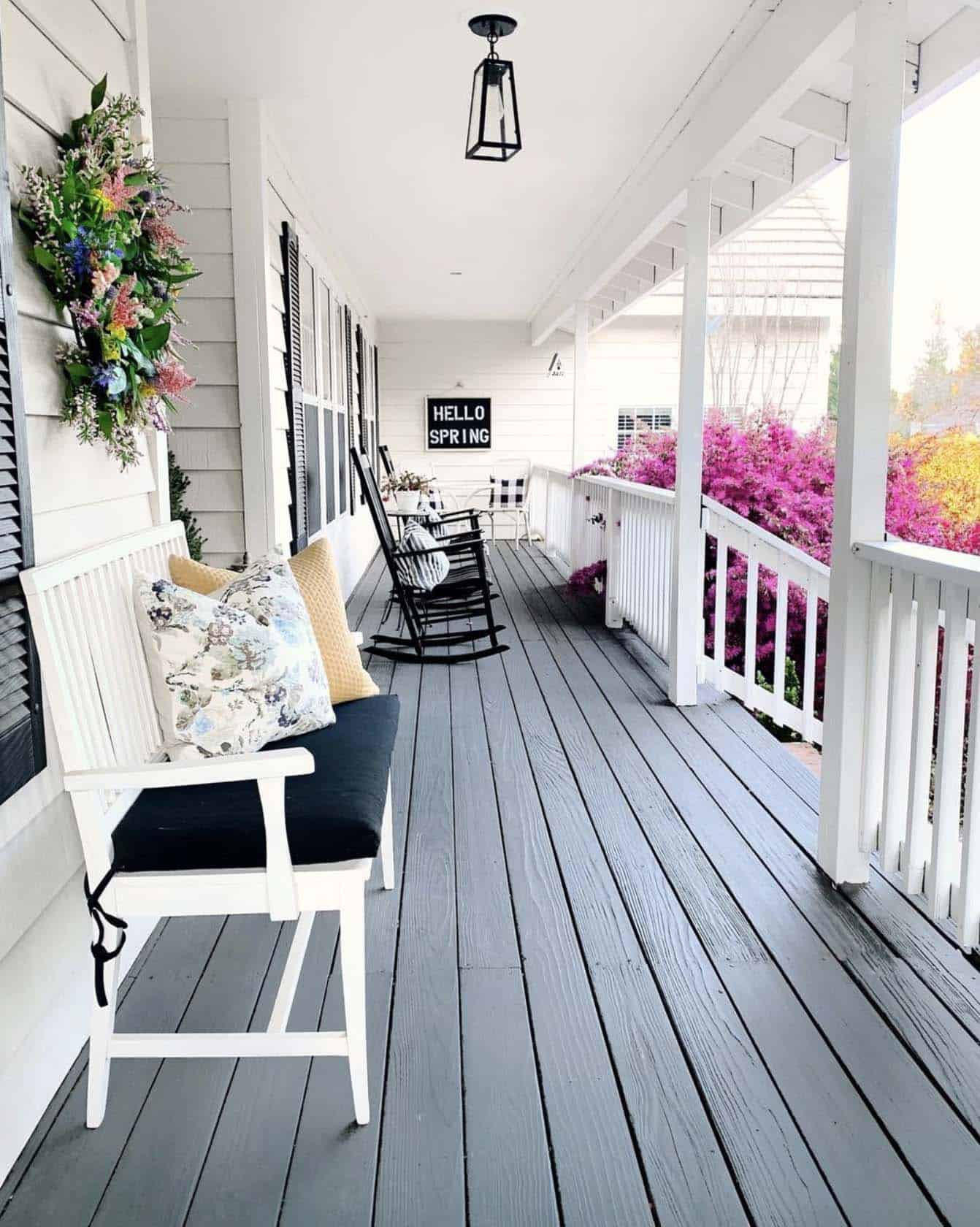 covered front porch decorated for spring