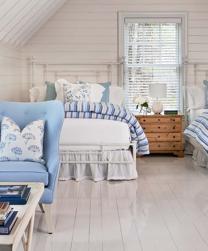 traditional coastal style attic guest bedroom