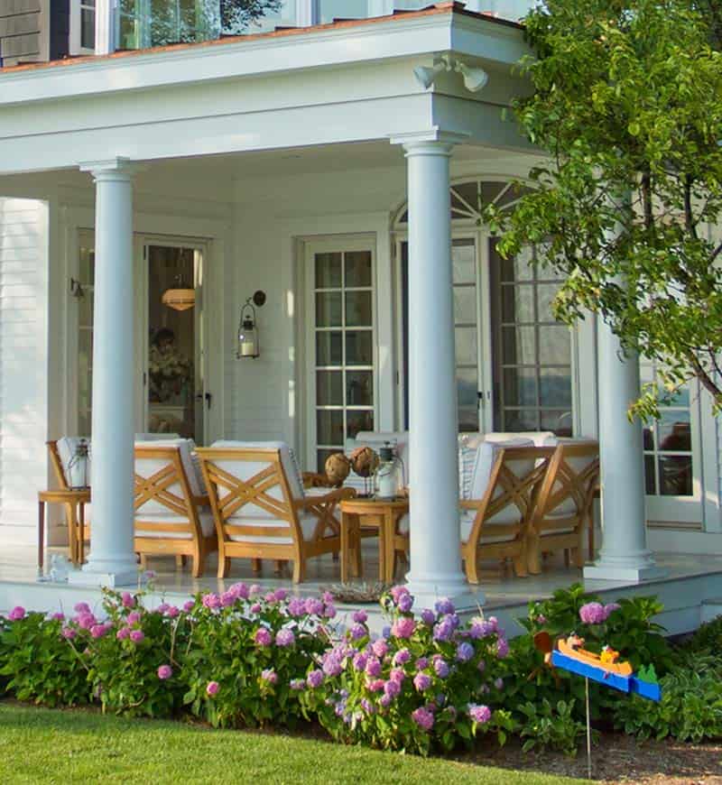 classic shingle-style cottage exterior backyard covered porch