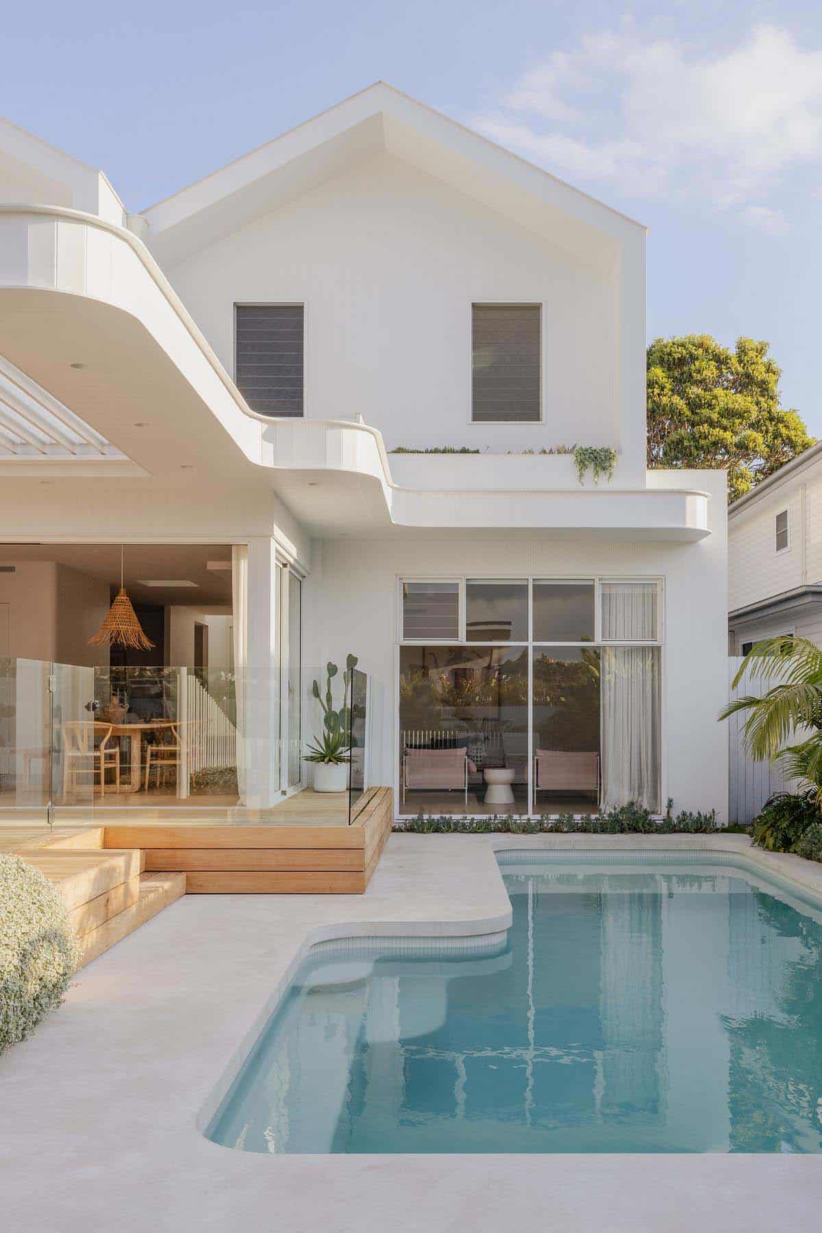 contemporary home exterior backyard with a pool