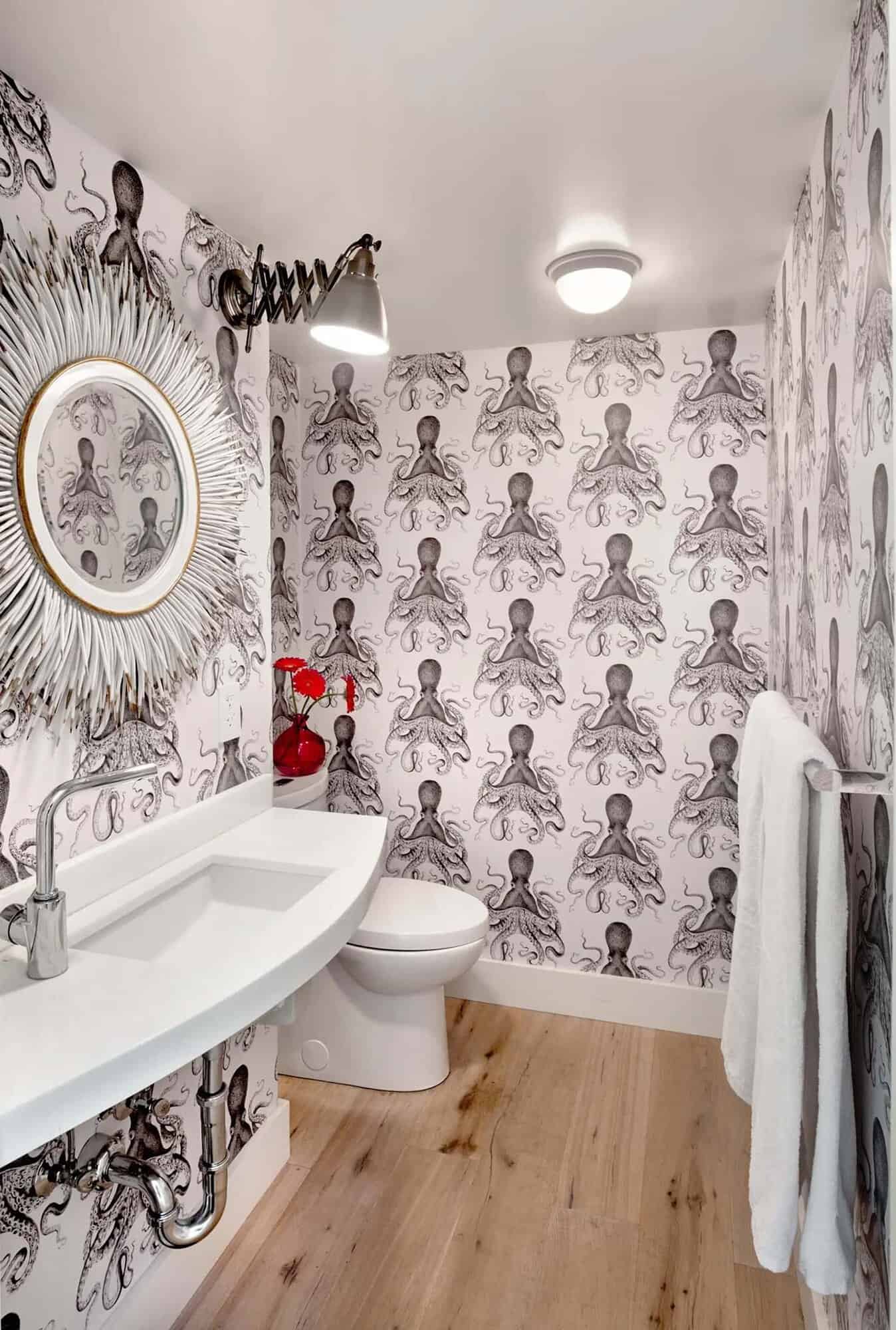 contemporary powder room with wallpaper