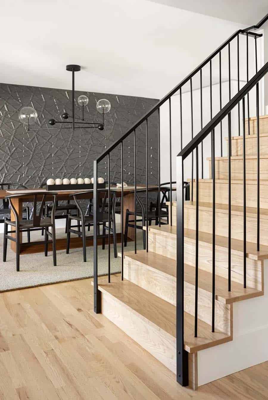 contemporary staircase with a view of the dining room