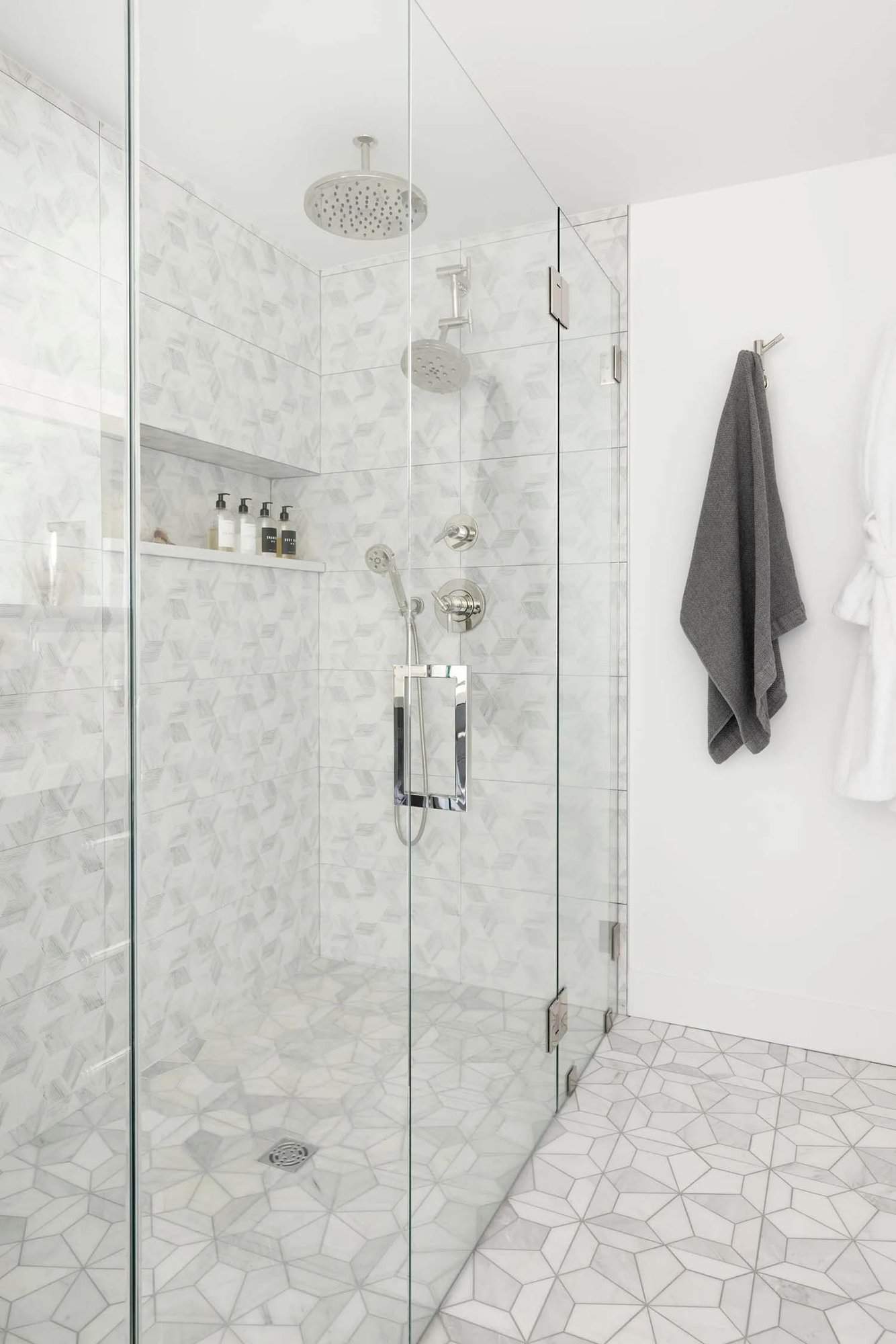 contemporary bathroom with a glass-enclosed shower
