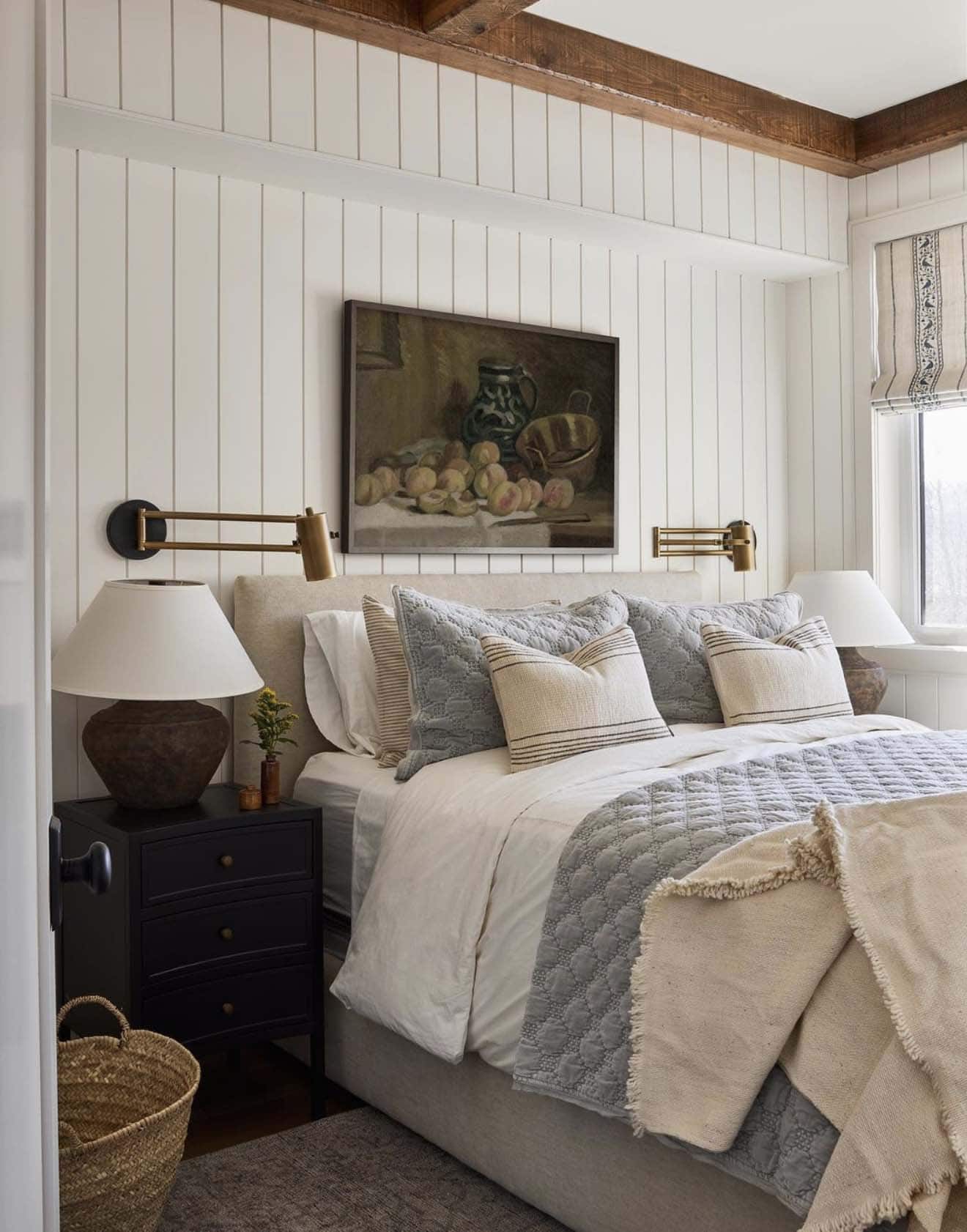 cozy guest bedroom with shiplap walls