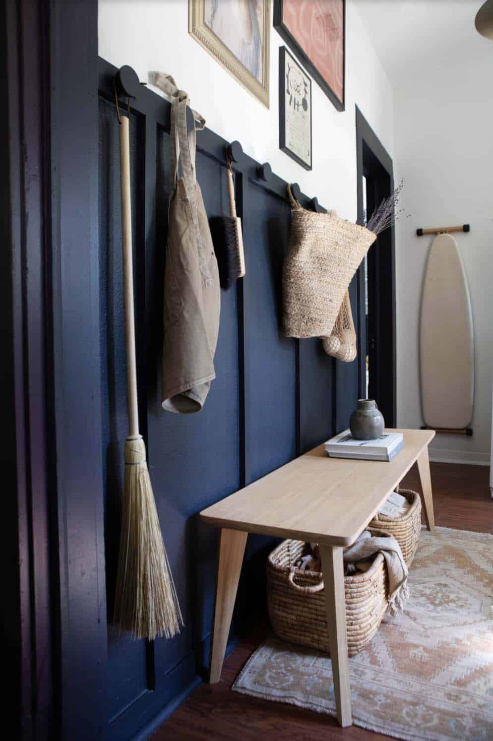 modern mudroom entry with a bench