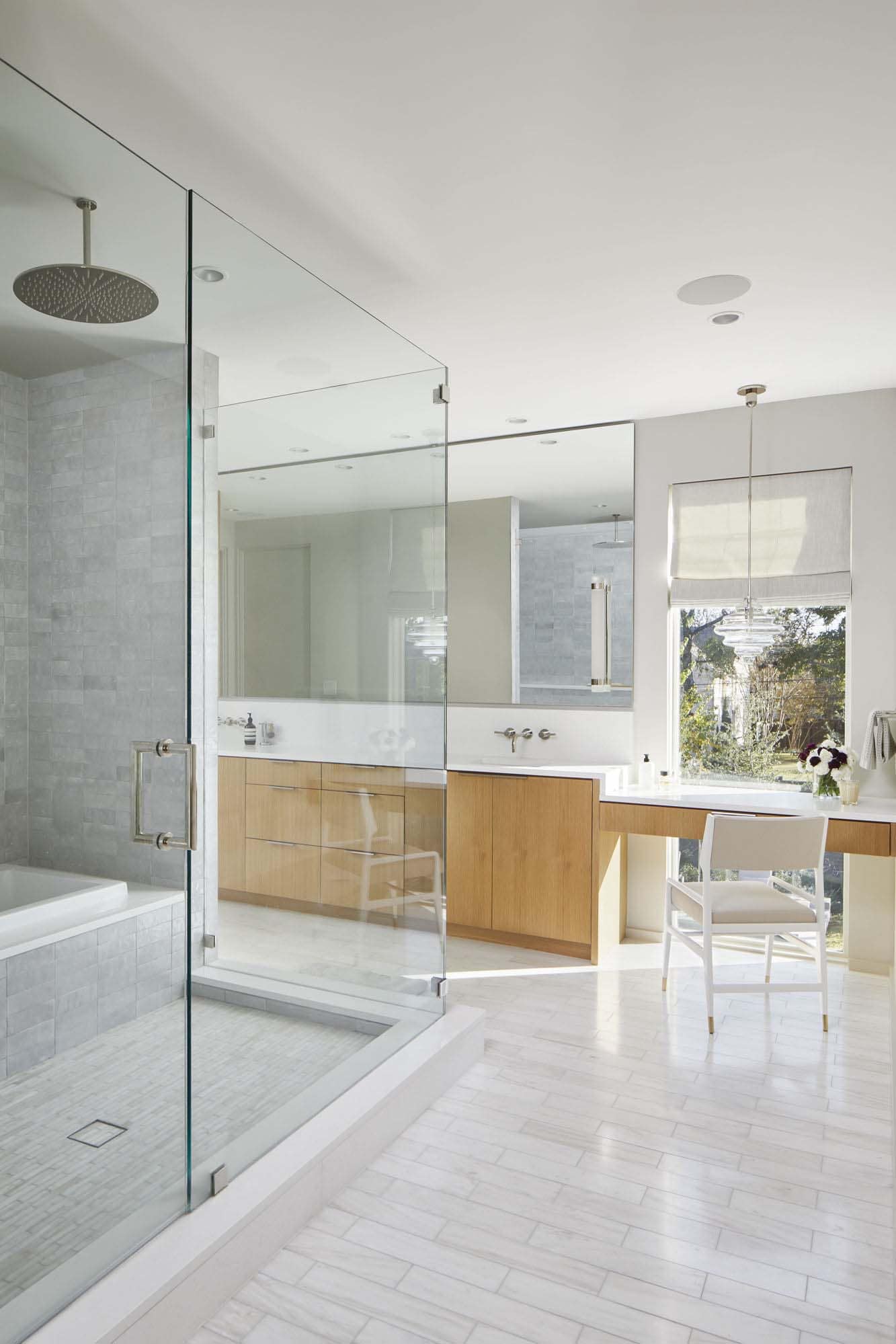modern bathroom with a vanity and glass-enclosed shower