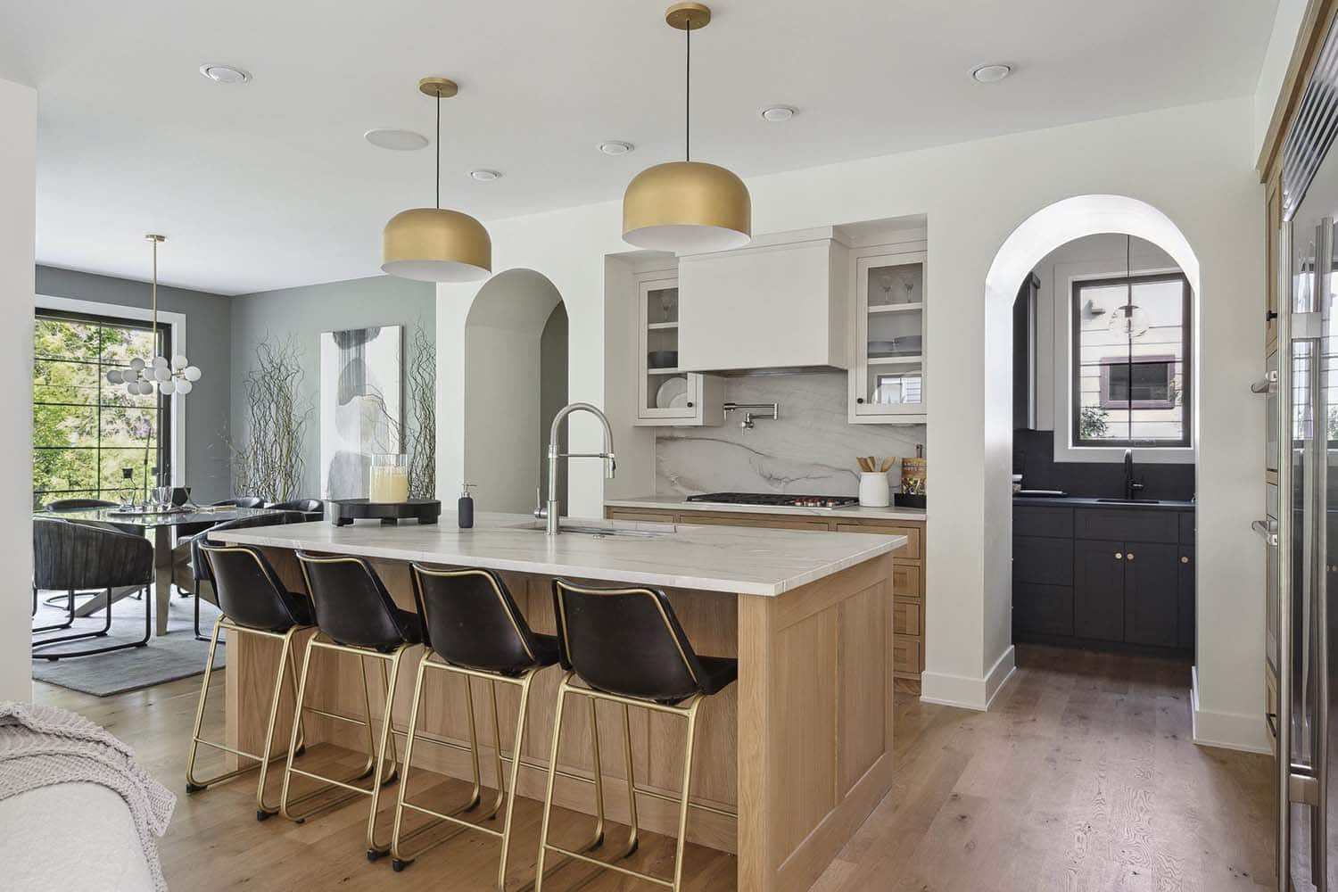 modern kitchen with large pendant lights