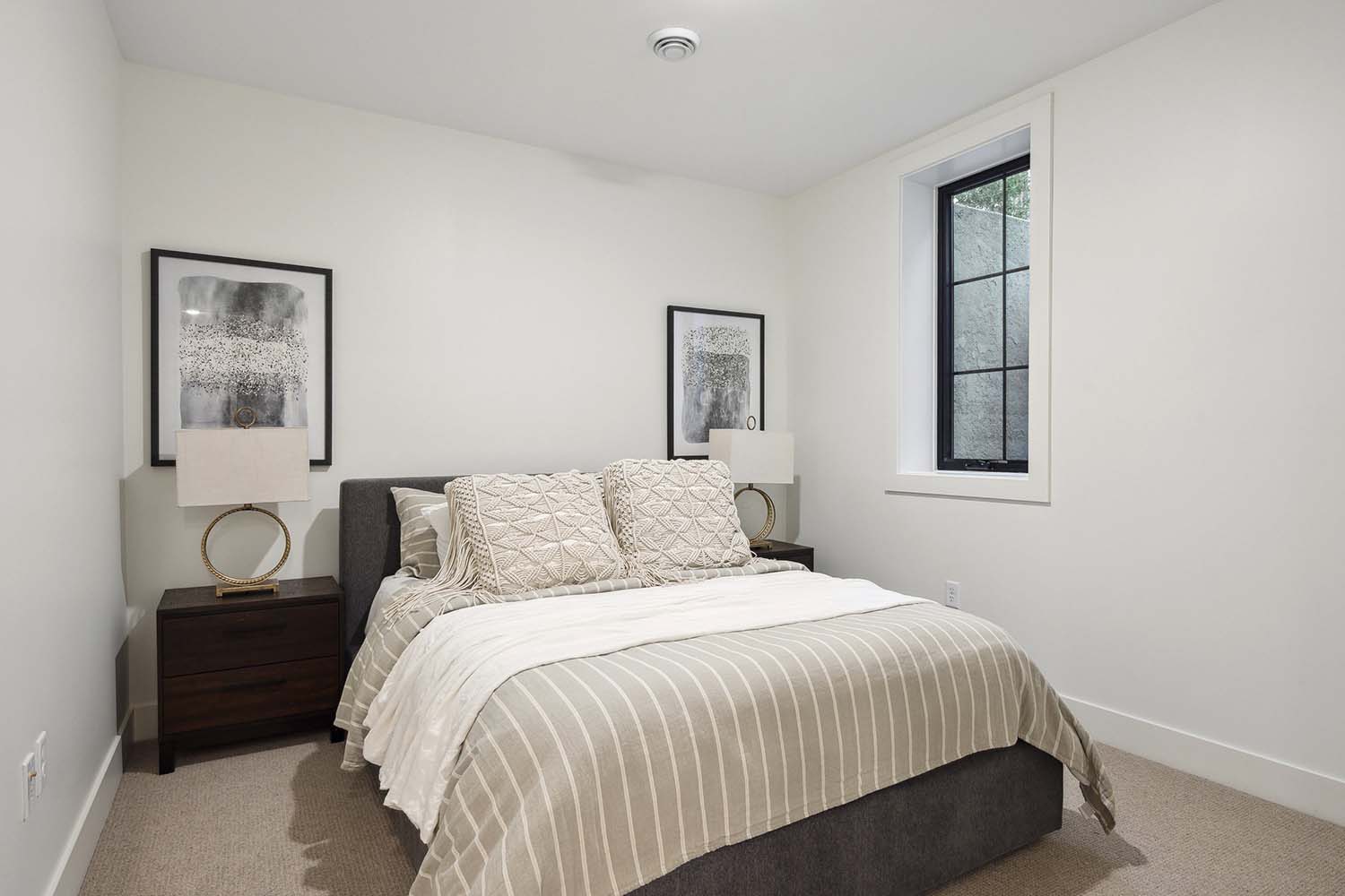 modern lower-level guest bedroom