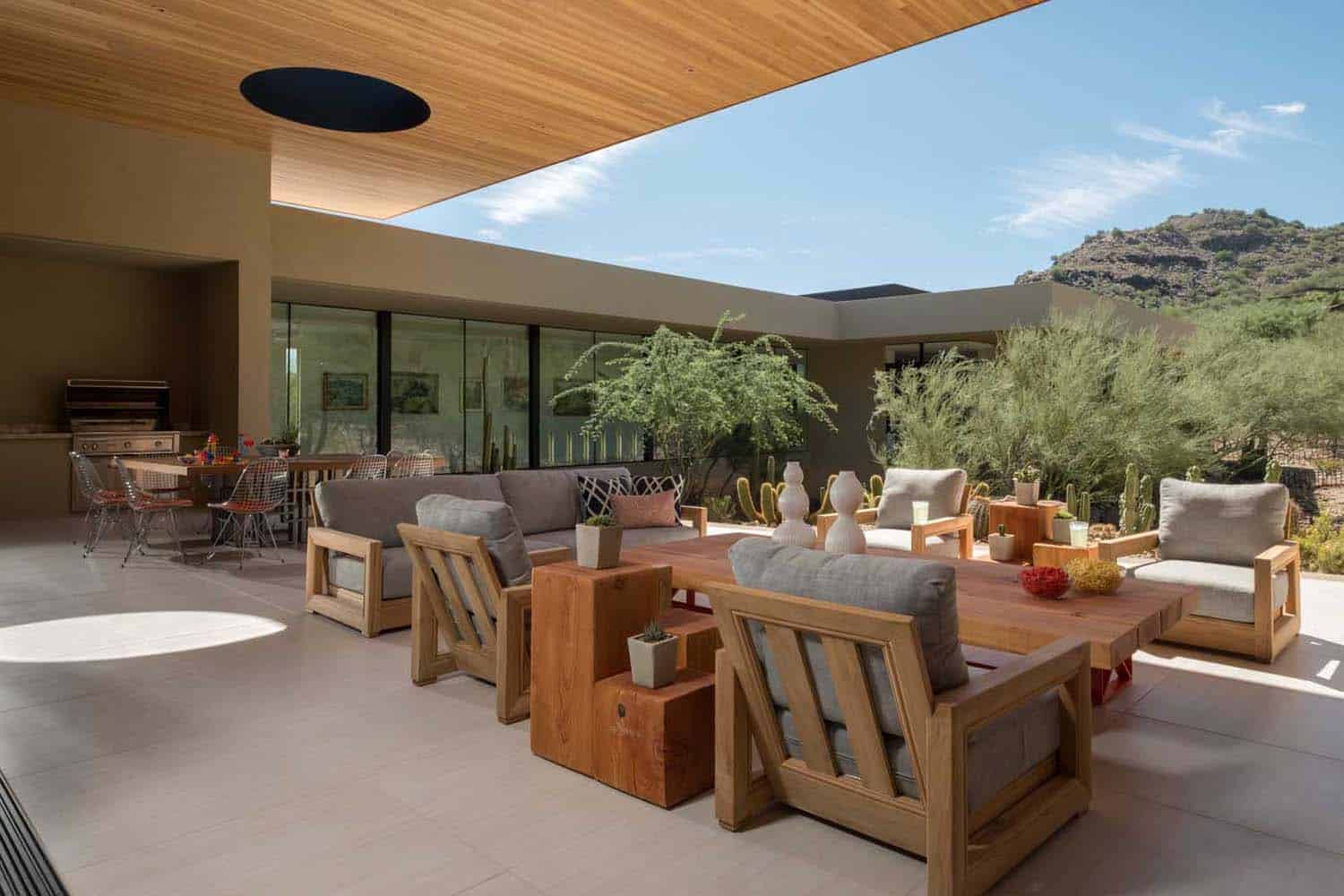 modern covered patio with outdoor furniture
