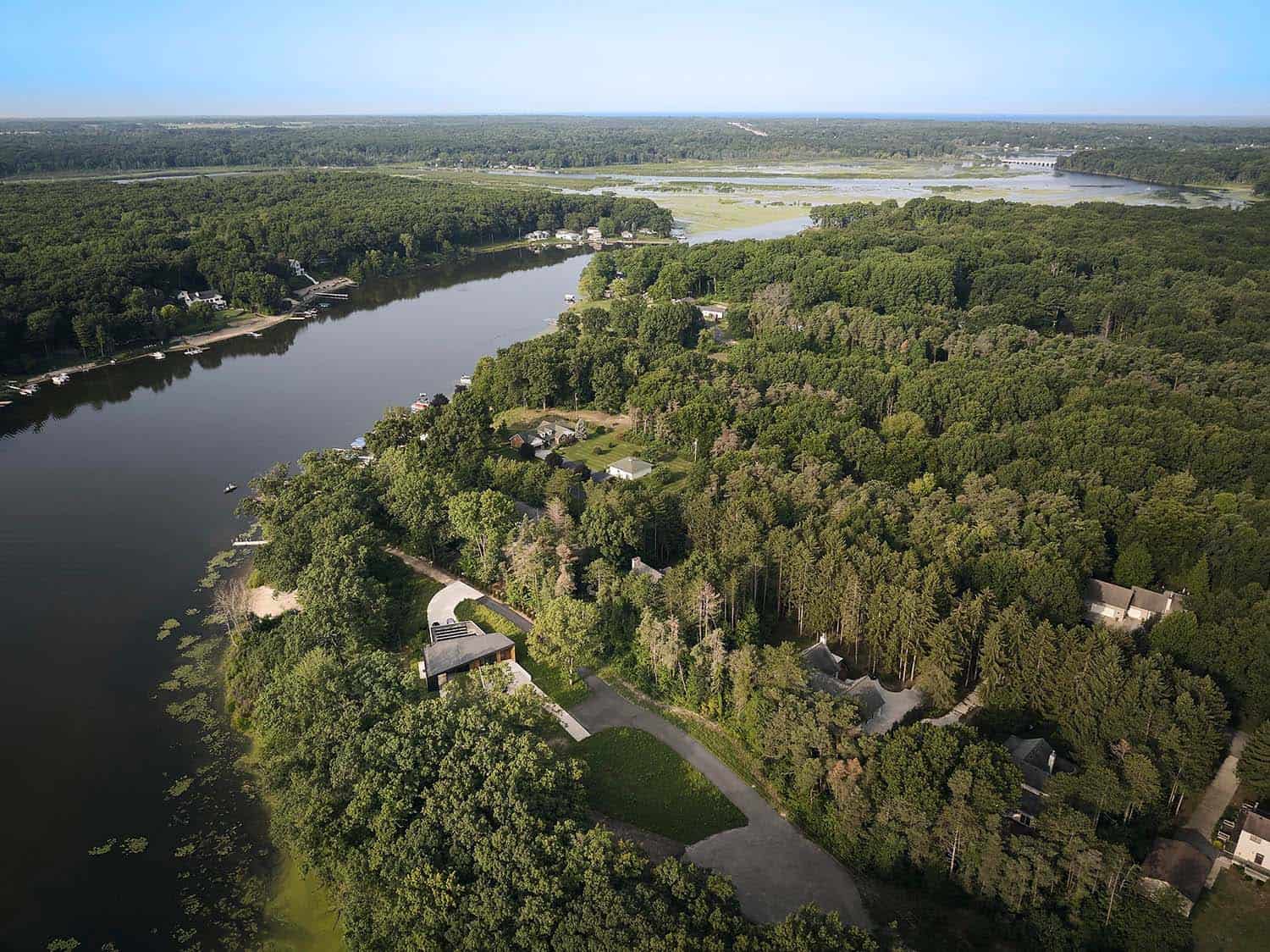 modern lake house retreat aerial view