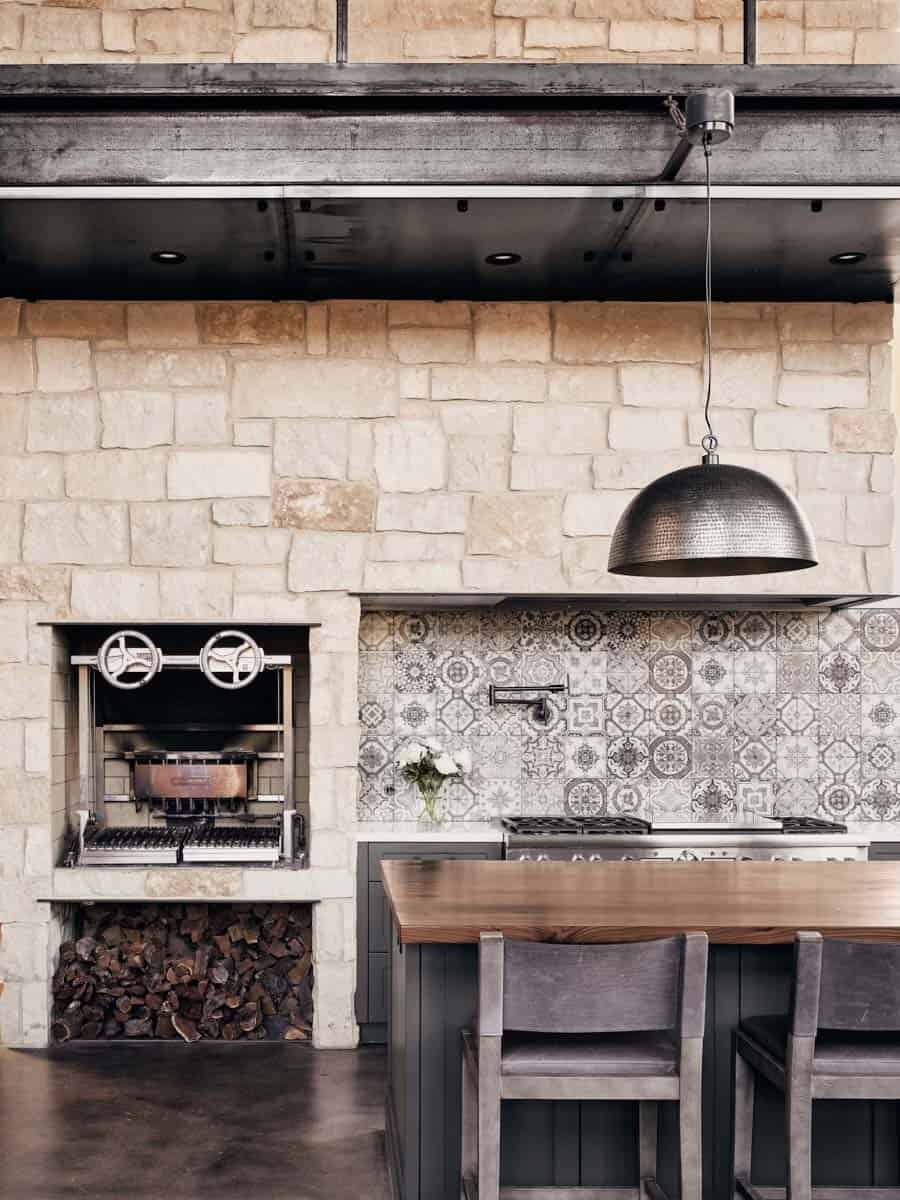 modern kitchen with a limestone chimney