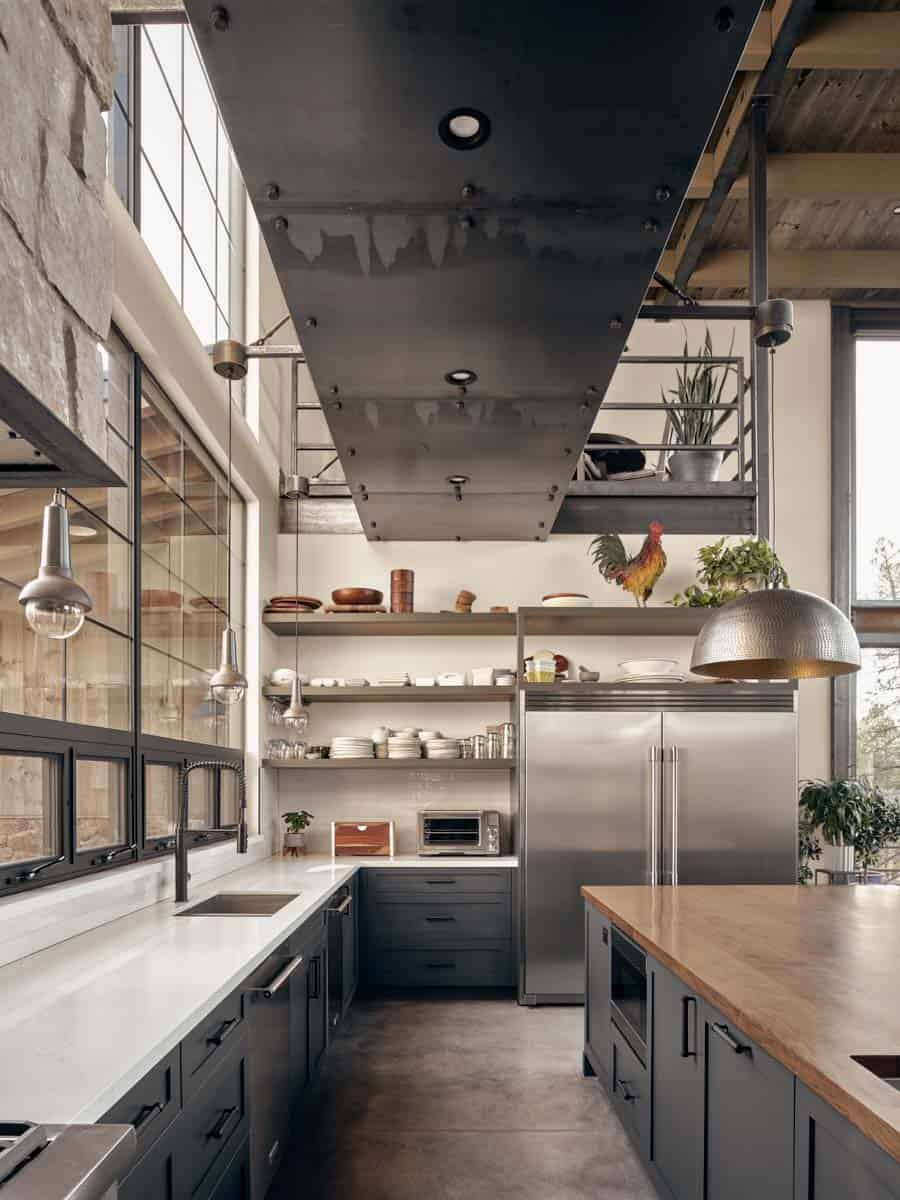 modern kitchen with an overhead steel bridge and integrated task lighting