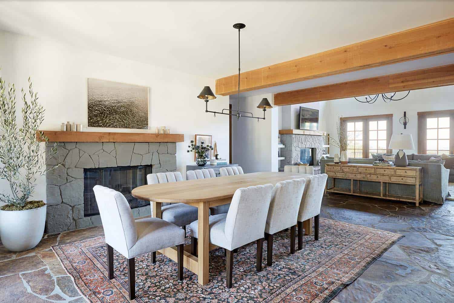 modern rustic dining room with a fireplace