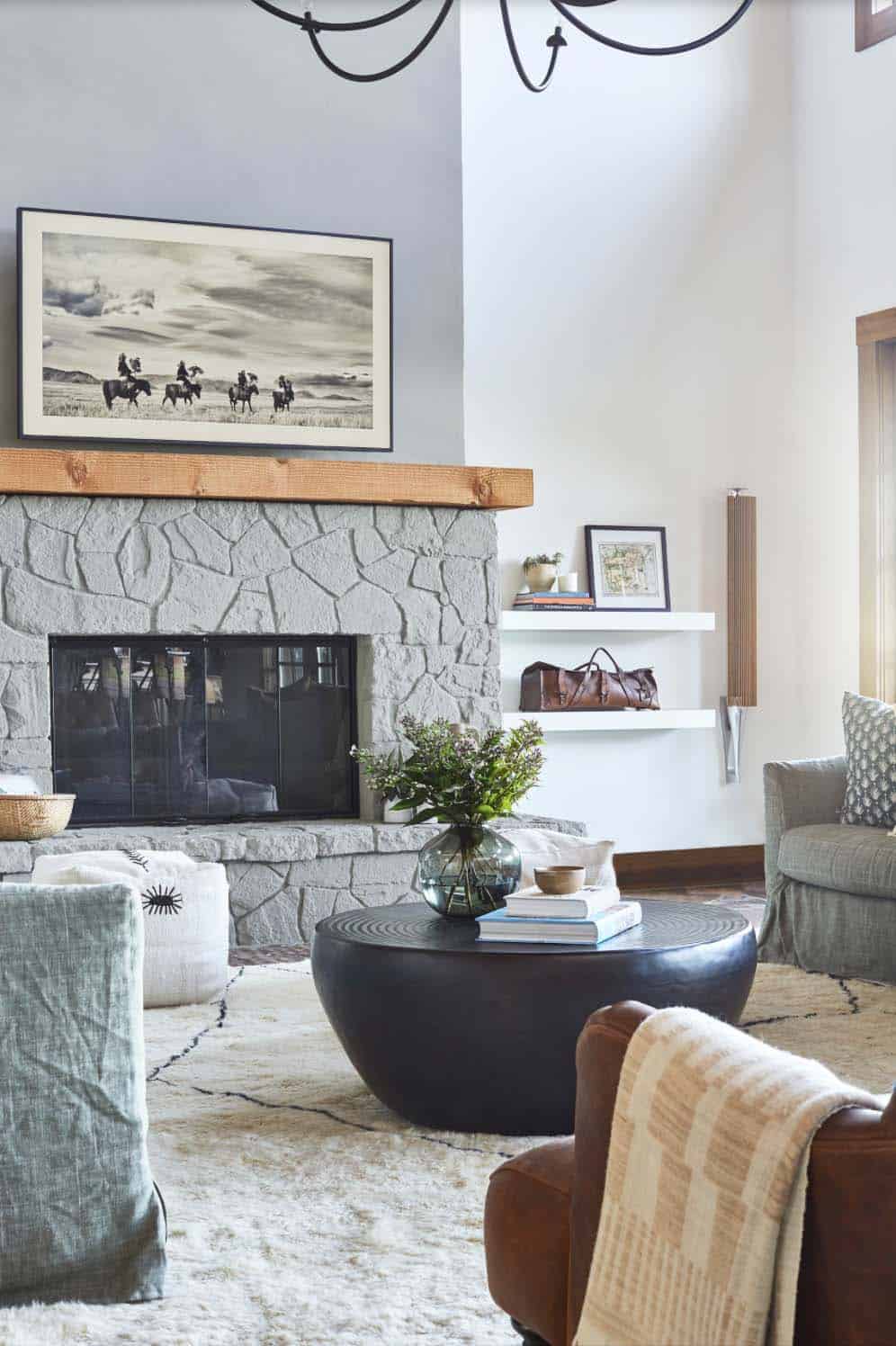 modern rustic family room with a fireplace
