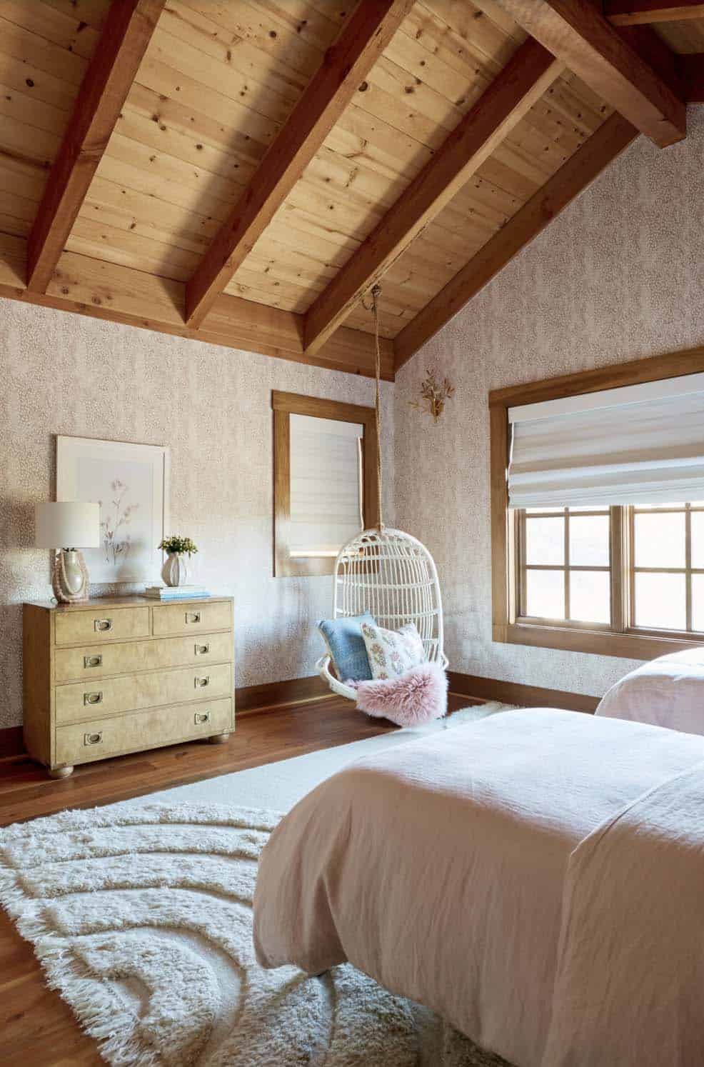 modern rustic bedroom with a hanging chair