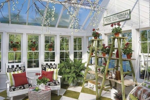 greenhouse garden shed with outdoor furniture and plants