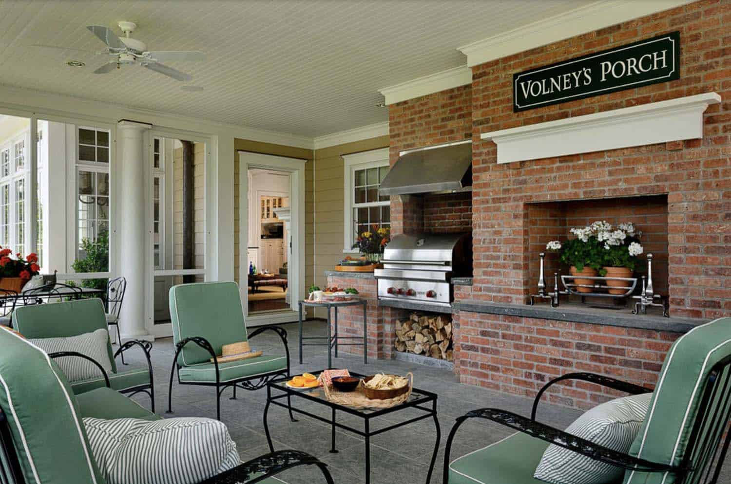 traditional style porch with a grill station and outdoor furniture