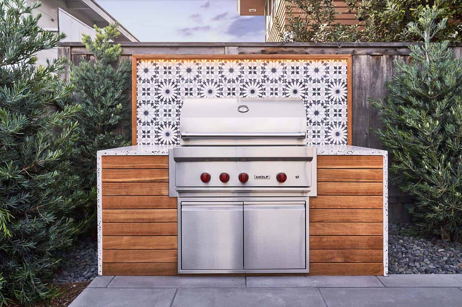 contemporary backyard patio with a grill station