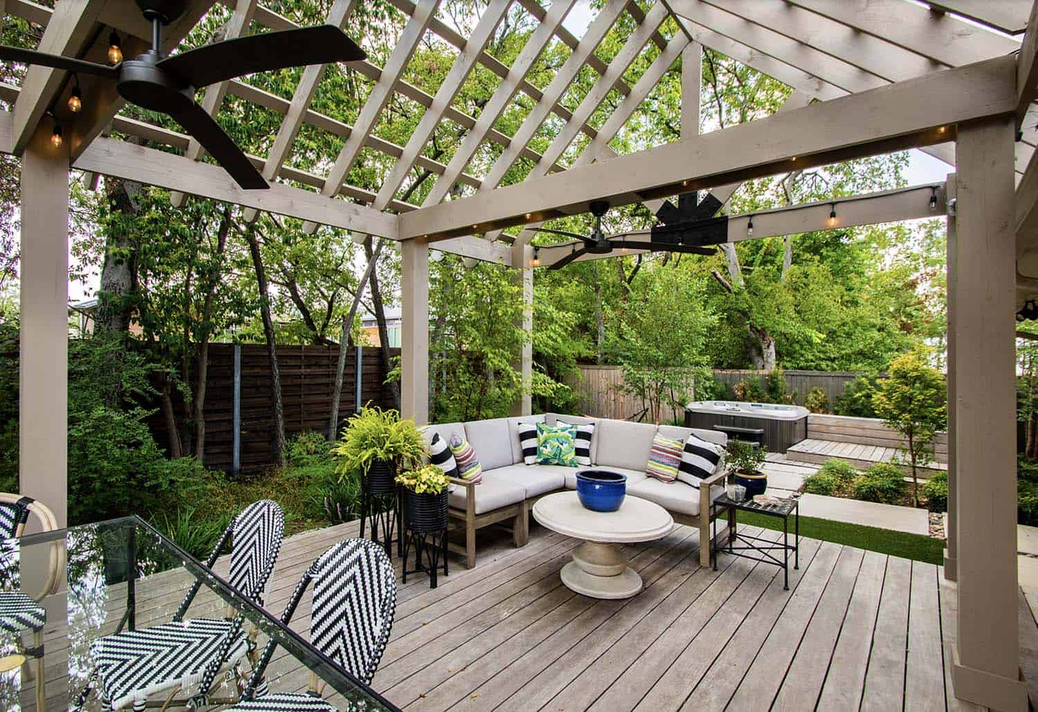 transitional style deck with a pergola