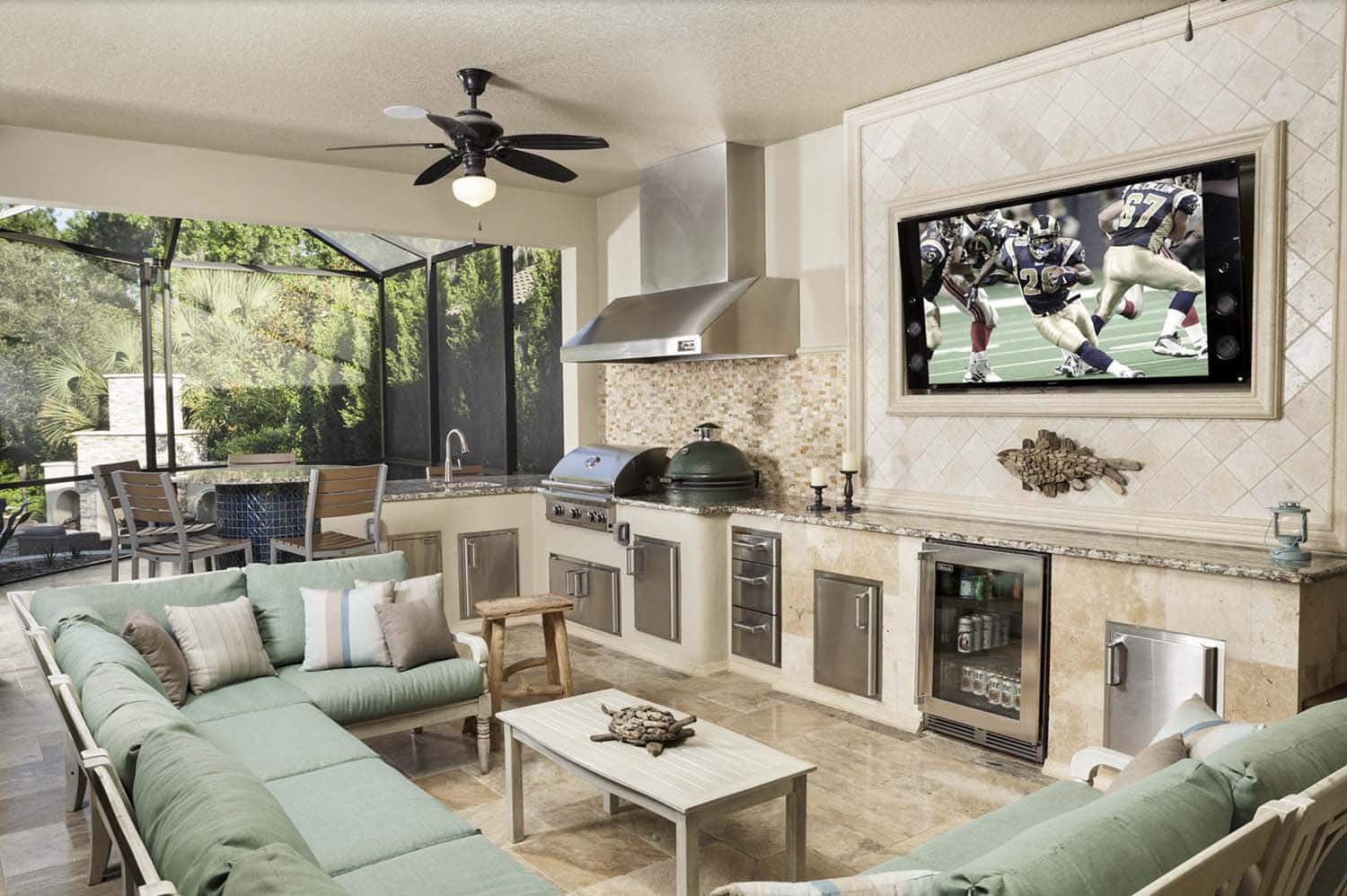 mediterranean style screened open plan kitchen and media room