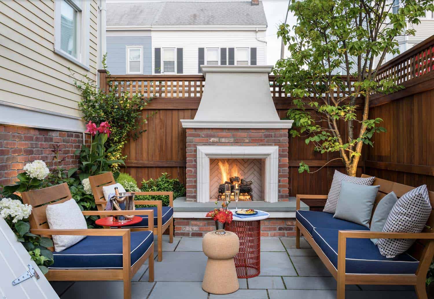 urban outdoor living with a fireplace and furniture