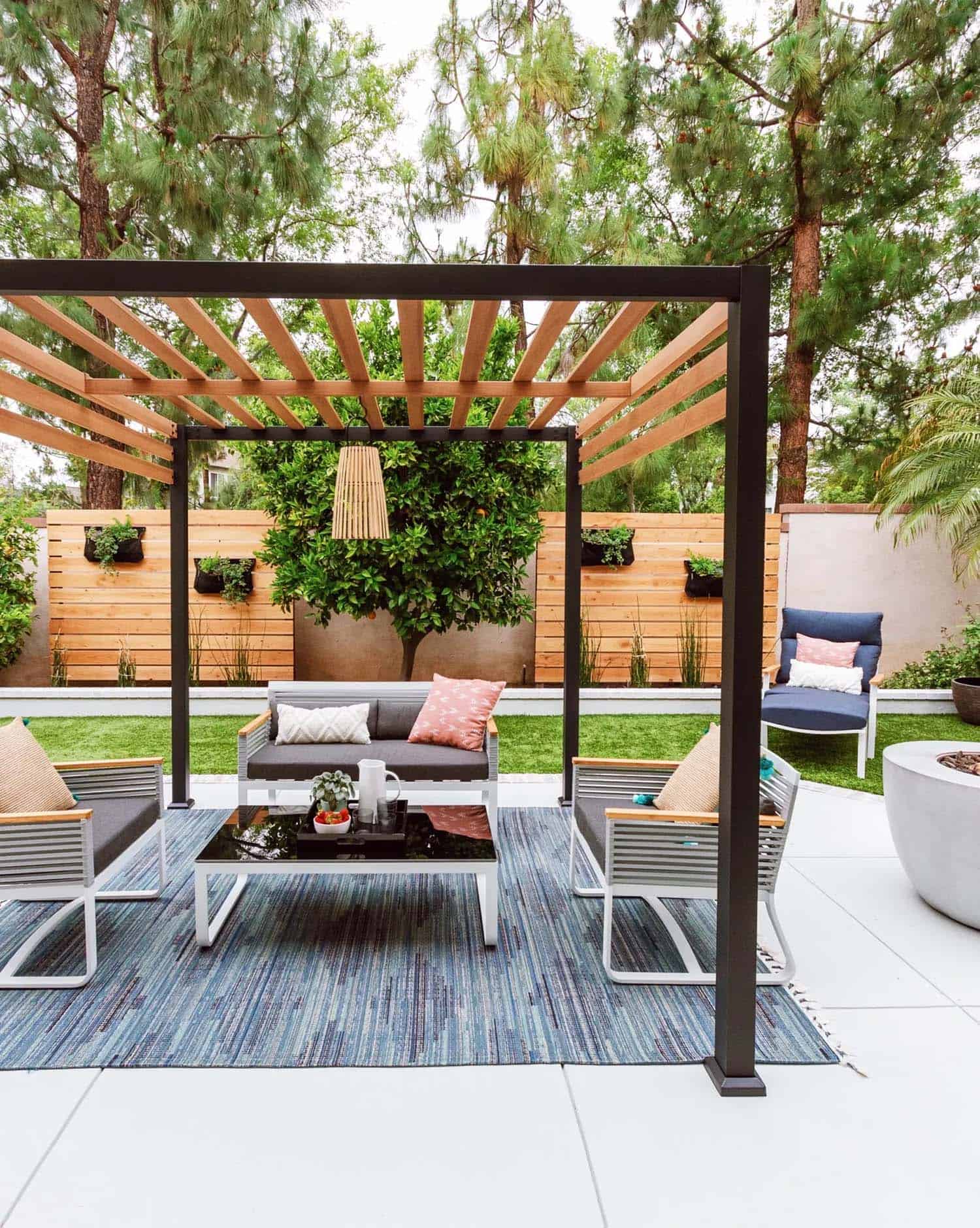 backyard outdoor living room with a pergola