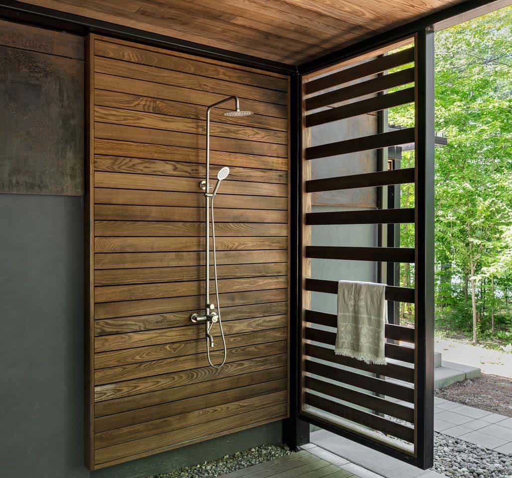 modern lake house exterior with an outdoor shower