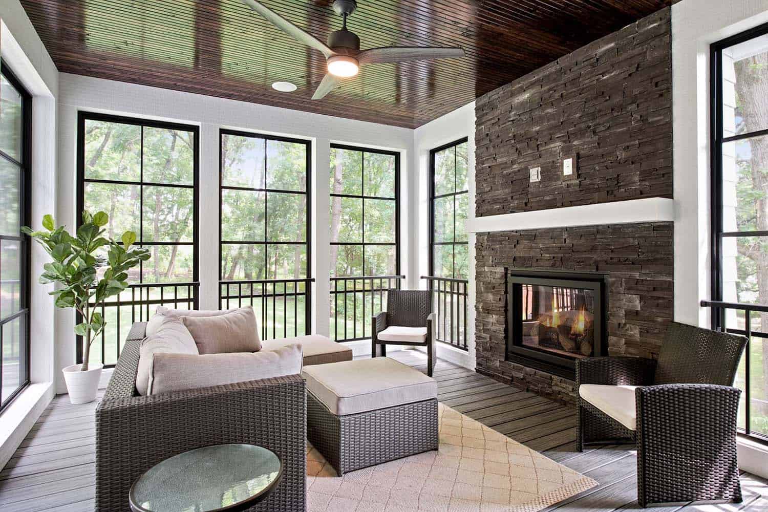 modern farmhouse screened porch with a fireplace