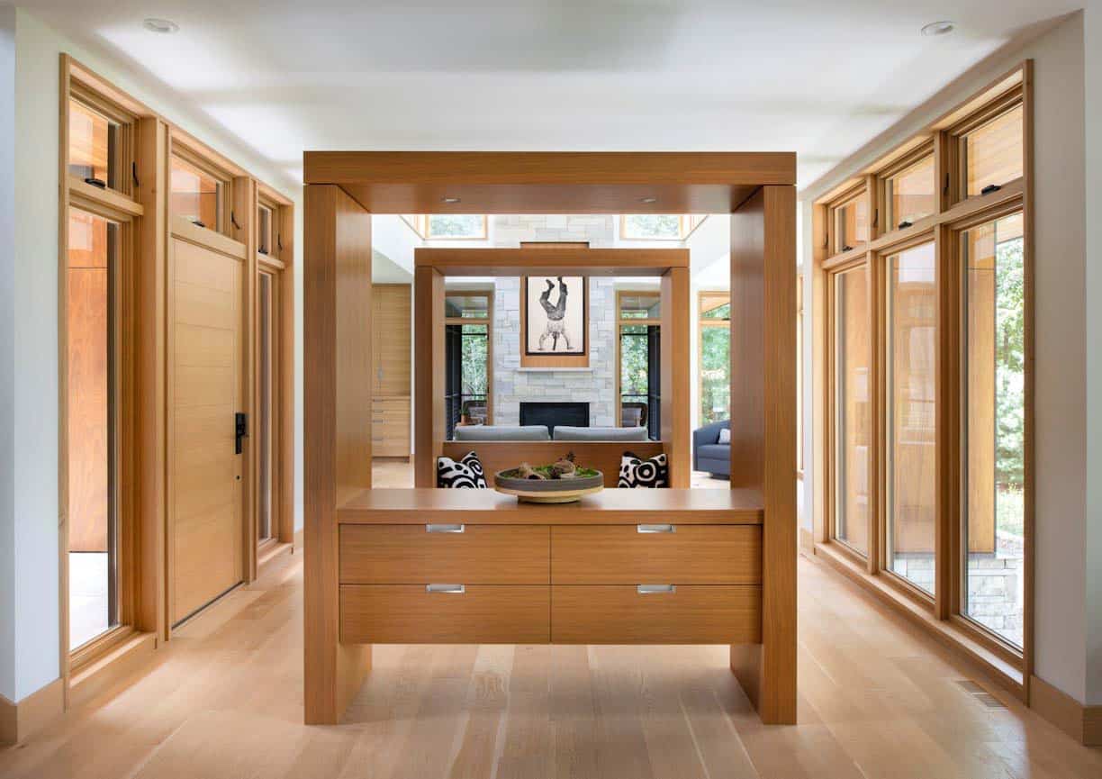 modern living room with a built-in cabinet room divider