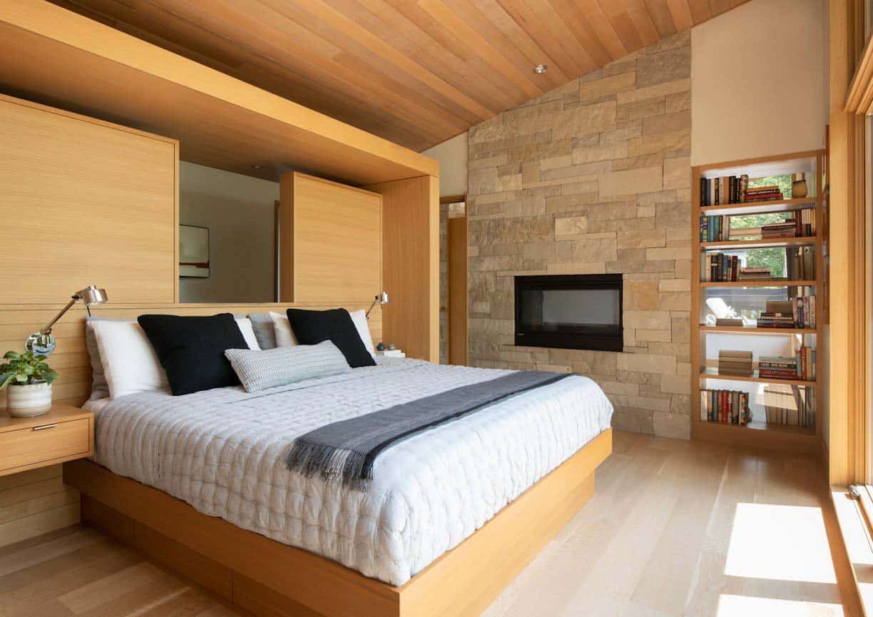 modern bedroom with a fireplace