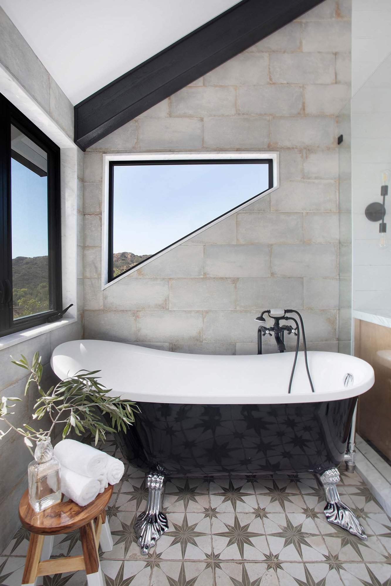 modern farmhouse bathroom with a clawfoot tub
