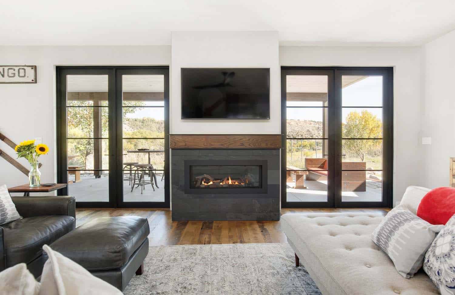 modern farmhouse living room with a fireplace