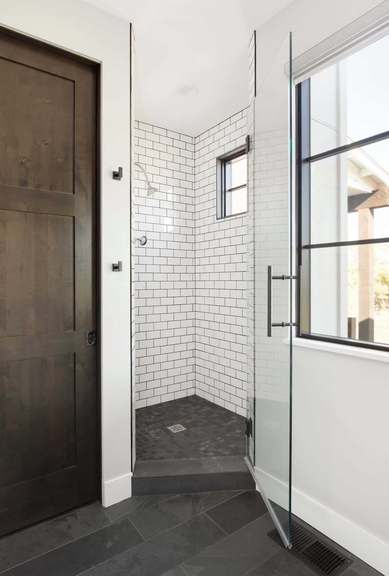modern farmhouse bathroom with a glass-enclosed shower