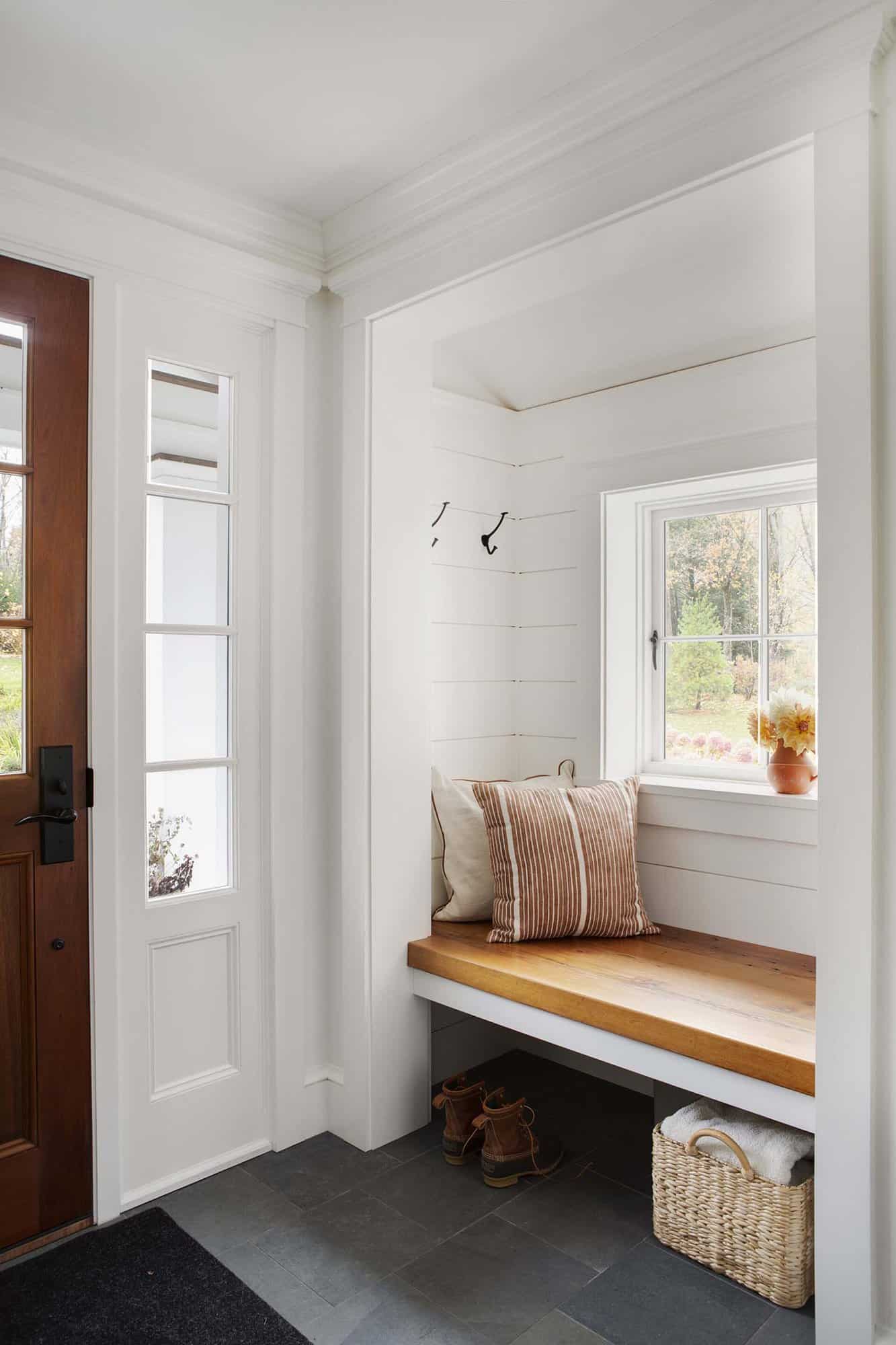modern farmhouse entry with a built-in window bench