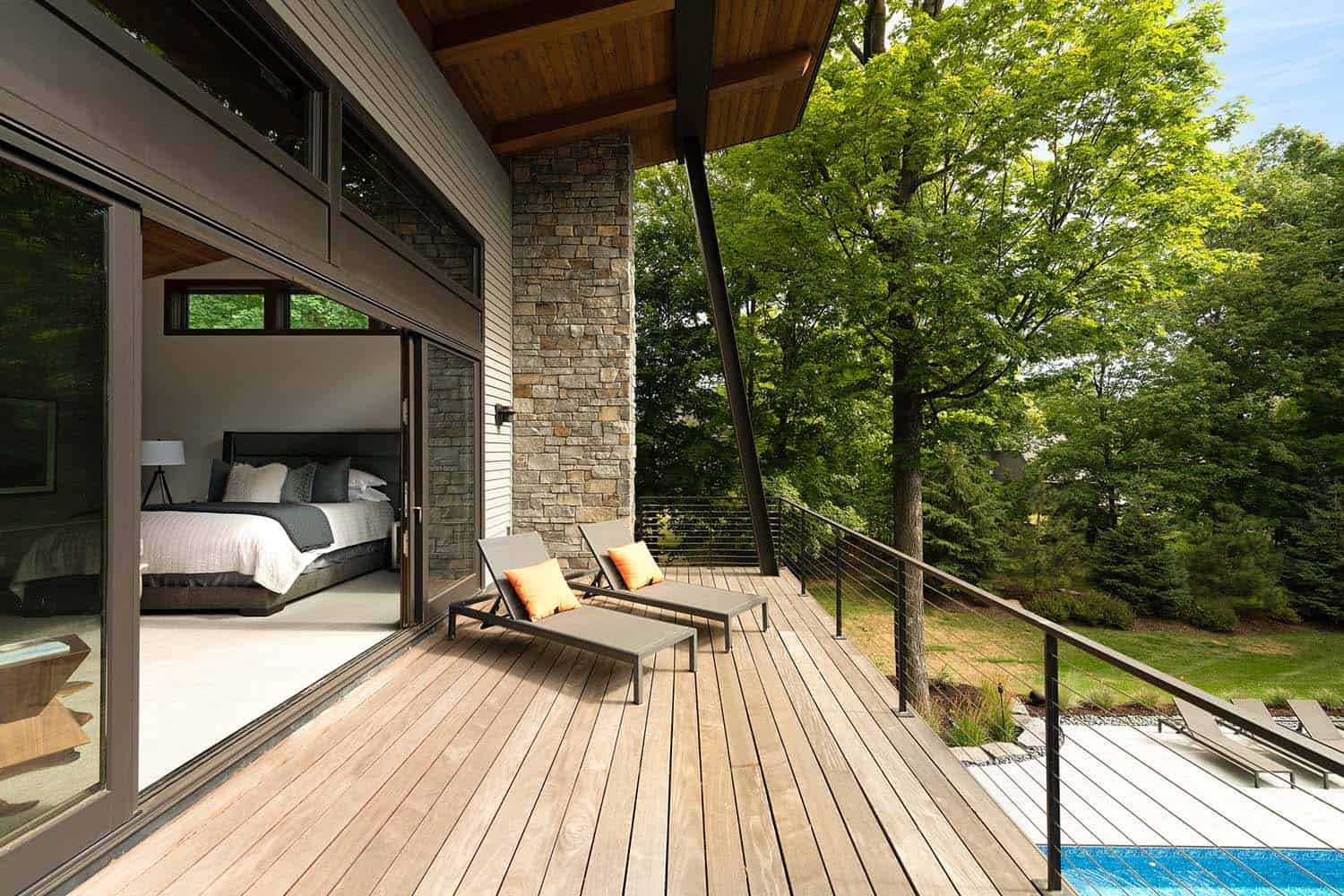 modern bedroom with a private deck