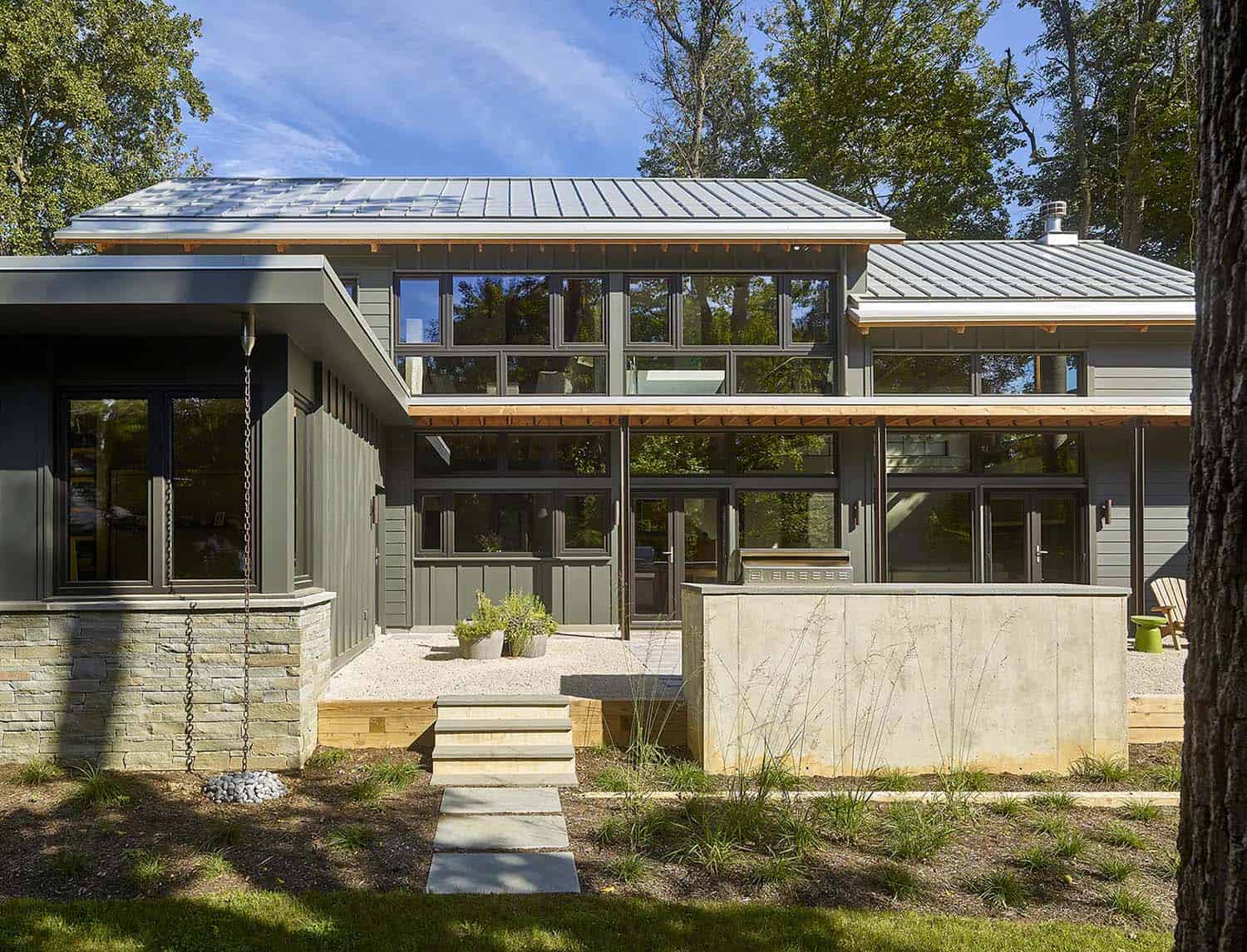 contemporary passive solar house backyard patio