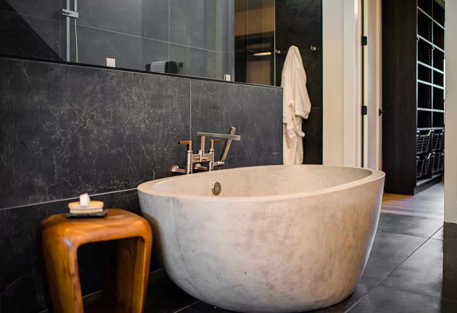 scandinavian bathroom with a freestanding tub