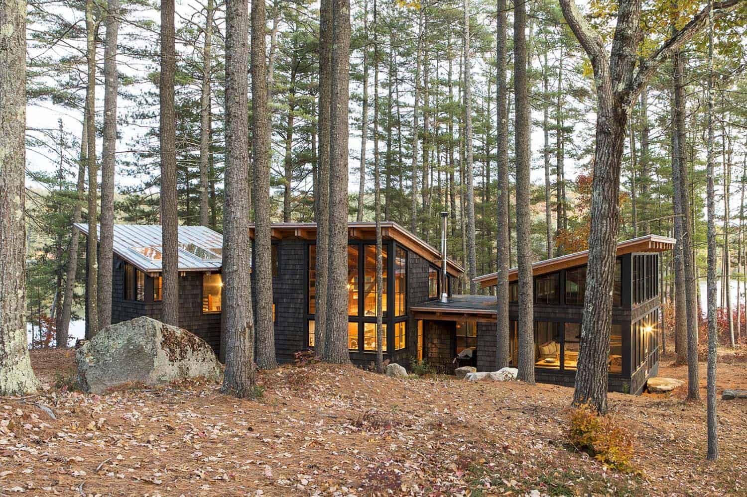 off-the-grid island camp exterior surrounded by woods