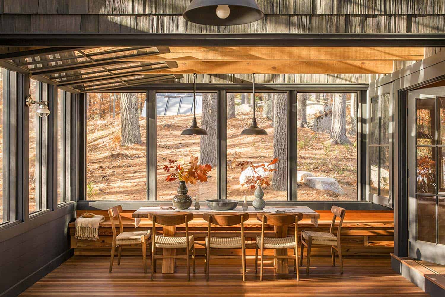 rustic dining room with large windows