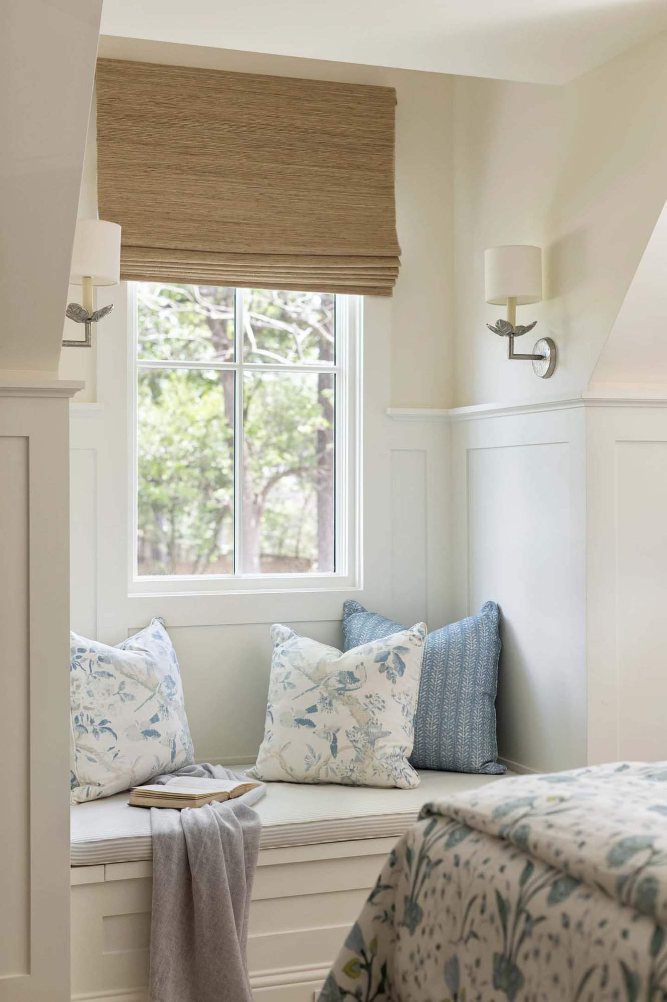 traditional guest bedroom with a reading nook in an alcove