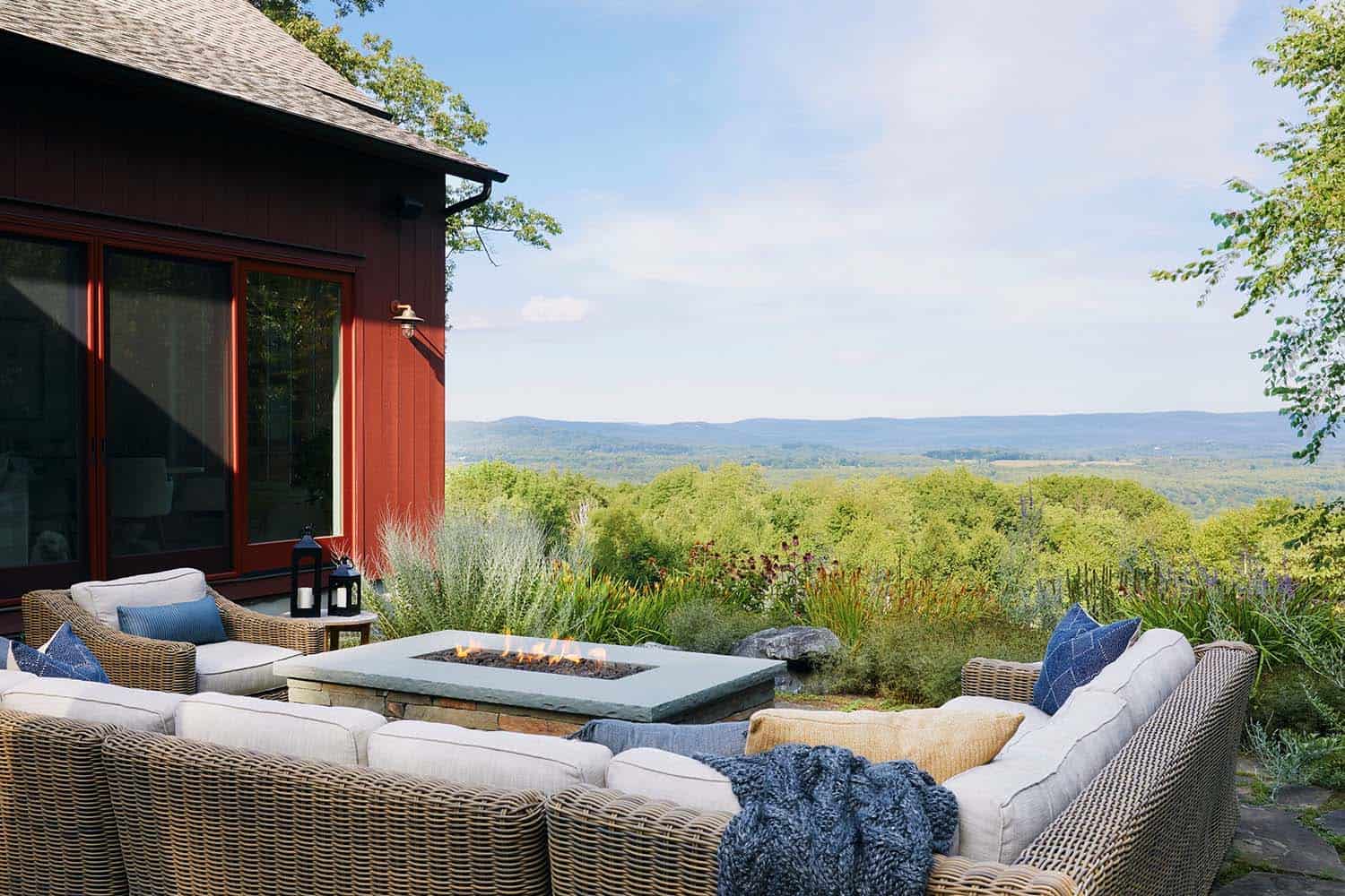 red barn outdoor patio with a fire pit