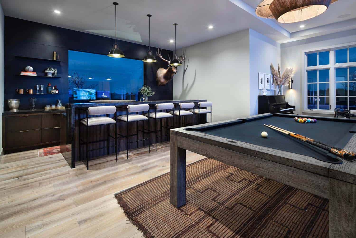 transitional style pool table and home bar