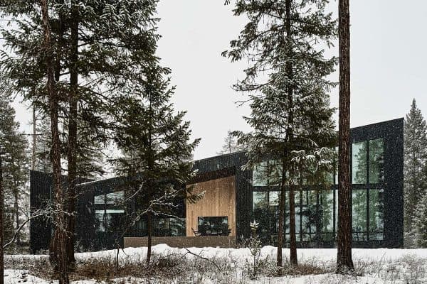 featured posts image for Black standing seam metal siding clads this Montana wilderness house