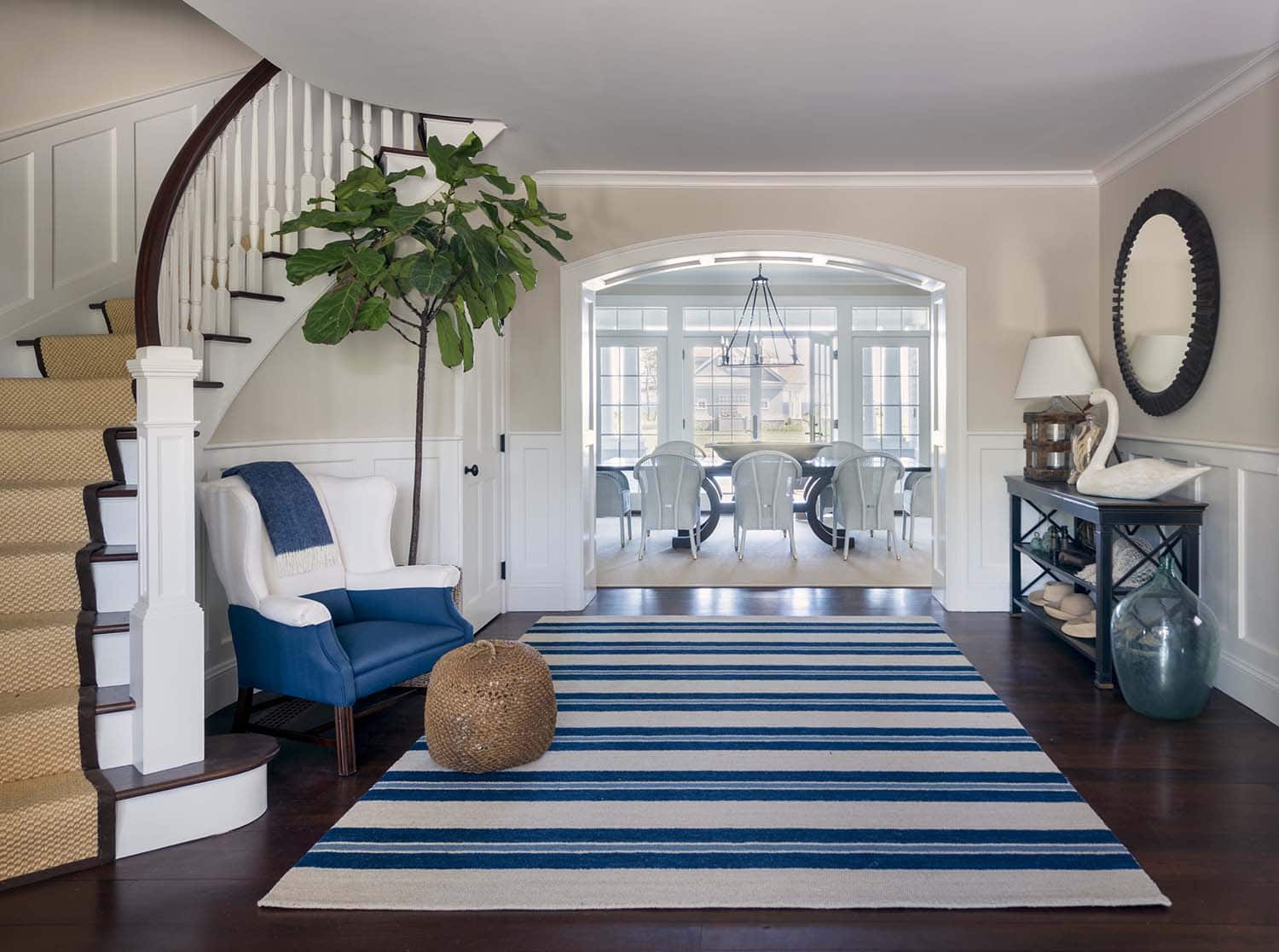 beach house entry with a large striped rug