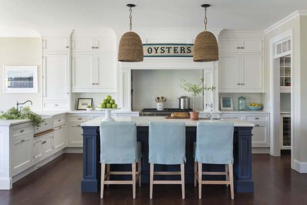 beach style kitchen with large pendant lights