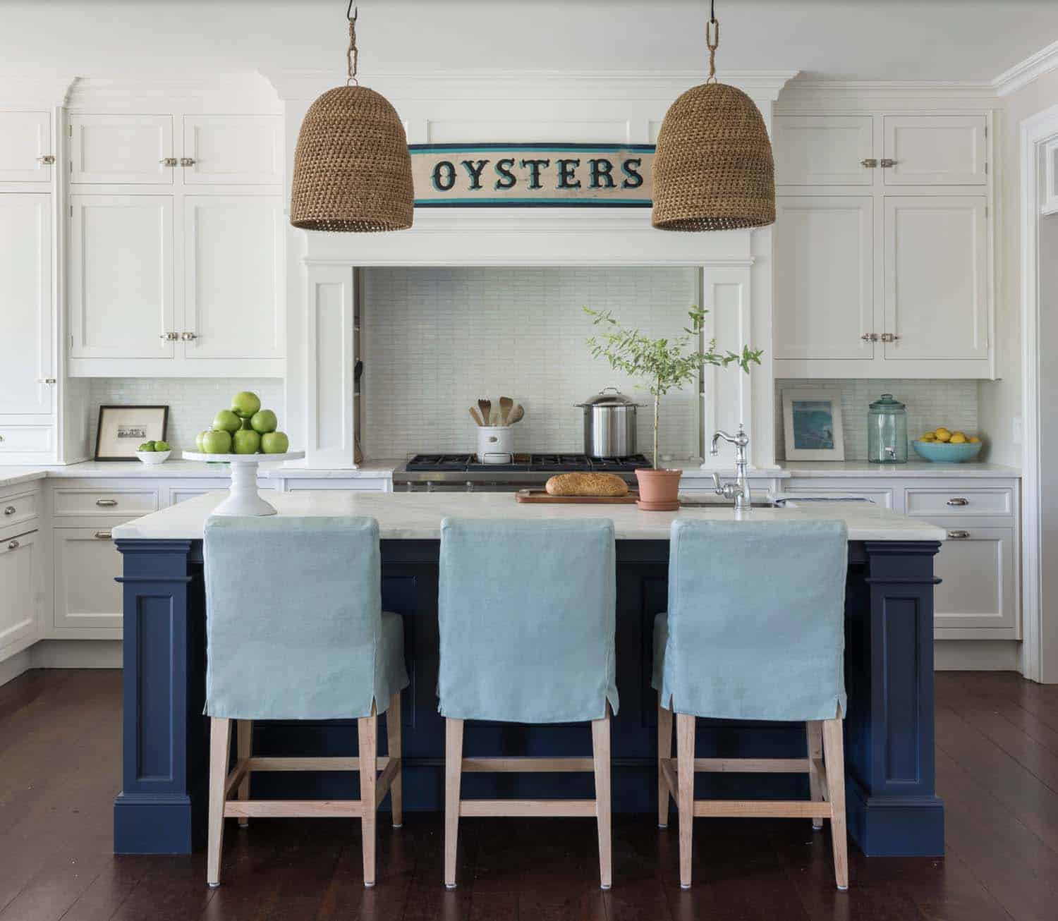 beach style kitchen with large pendant lights